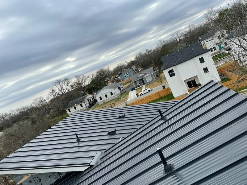Standing seam metal roof panels with vents for Skylight Repair in Gouverneur
